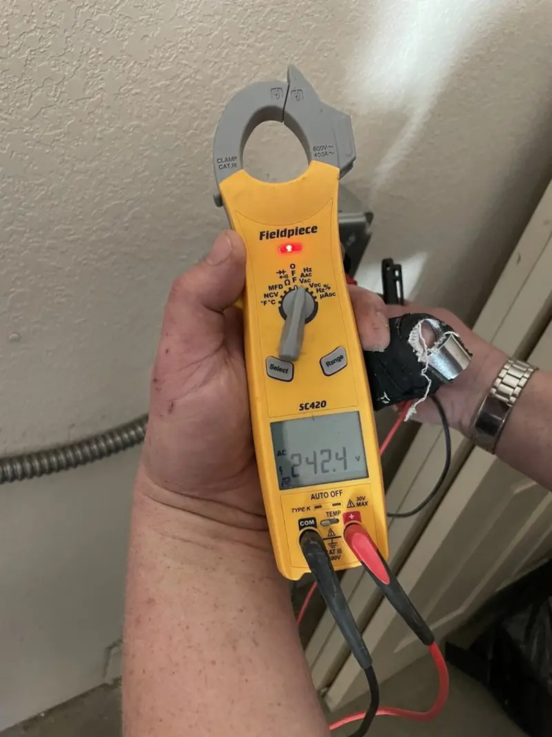 Voltage testing with clamp meter during Electrical Installation Services in Blackhawk
